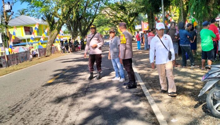 Polsek Karossa Gelar Pengamanan Lomba Olahraga Antar Desa Sambut HUT RI ke-79